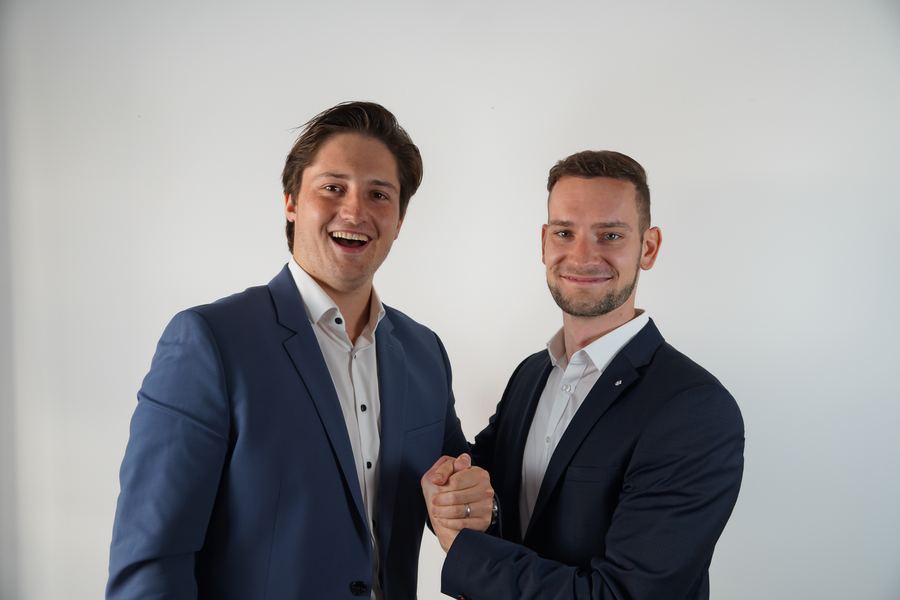 Sebastian Hilbert und Geschäftspartner